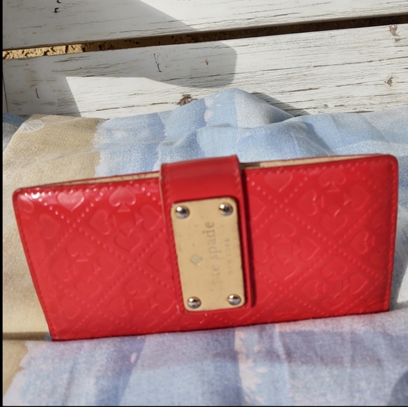 kate spade Handbags - Kate Spade Patent Leather Logo Embossed Wallet
